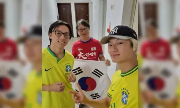 Sul-coreanos que moram em Curitiba apostam em Brasil forte, mas ressaltam luta da Coreia do Sul: 'Raça no jogo'